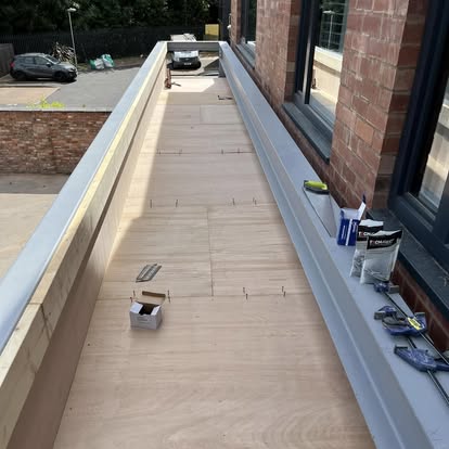 Narrow flat roof OSB deck urban building setting