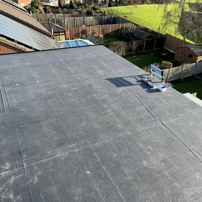 Large completed EPDM roof with skylight