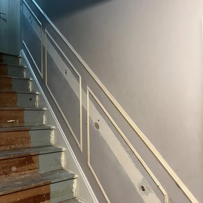 Staircase wall panelling being installed