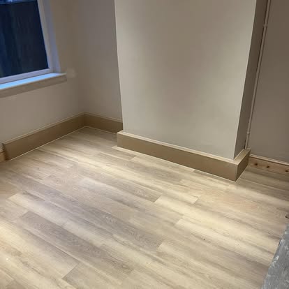 Light oak flooring with skirting boards