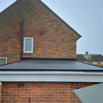 Completed EPDM flat roof brick extension