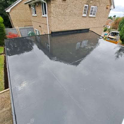 Large fresh EPDM flat roof on attached garage