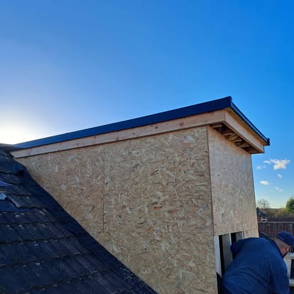 OSB dormer loft extension on slate roof