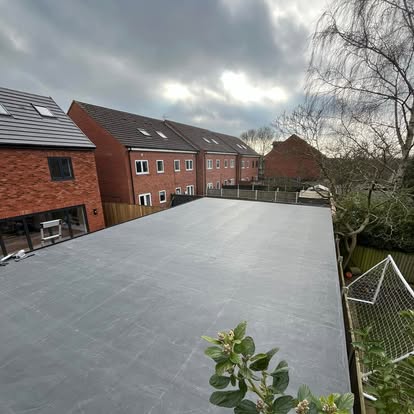 Large commercial EPDM flat roof aerial view