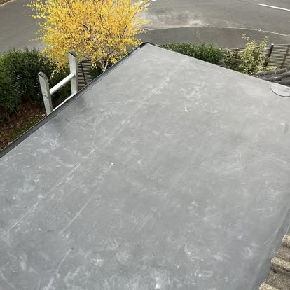 Completed EPDM flat roof autumn street view
