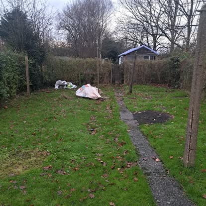 Garden site being prepared with survey pegs
