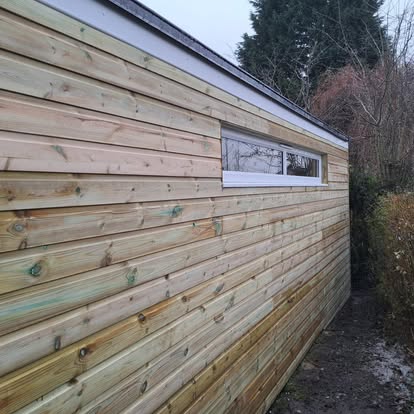 Garden room horizontal timber cladding side wall