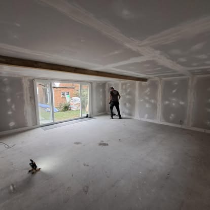 Large room interior plasterboard with bifold door