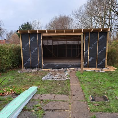 Garden room black membrane wrap and timber frame