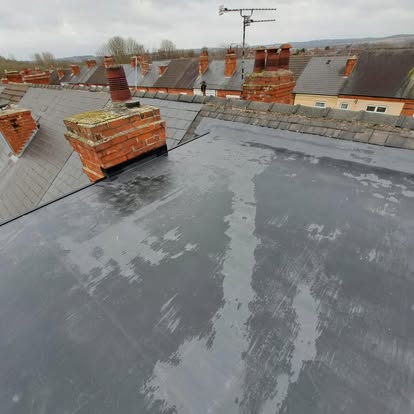 Completed EPDM flat roof urban terrace chimneys