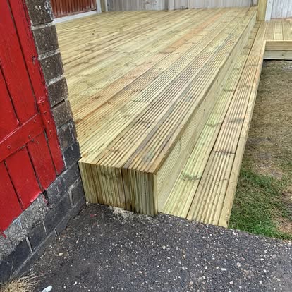 Completed large timber deck red brick building