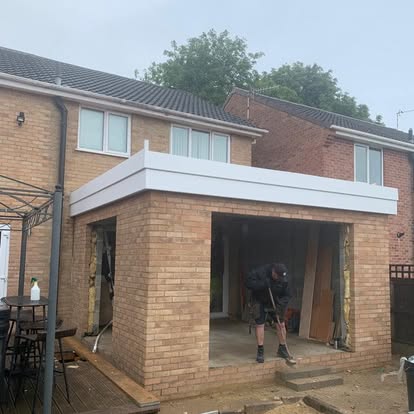 Rear single-storey open-front extension under construction