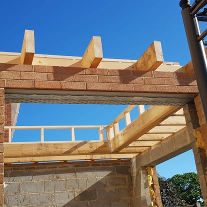 Single-storey extension roof joists on blockwork walls