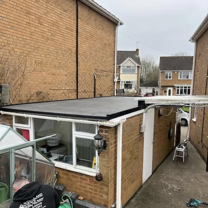 Completed EPDM on brick lean-to with Woodland Views worker