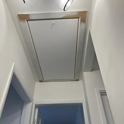 New loft access hatch with timber border