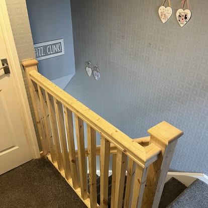 New pine staircase handrail close-up