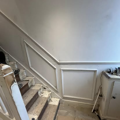 Staircase wall panelling installation in progress