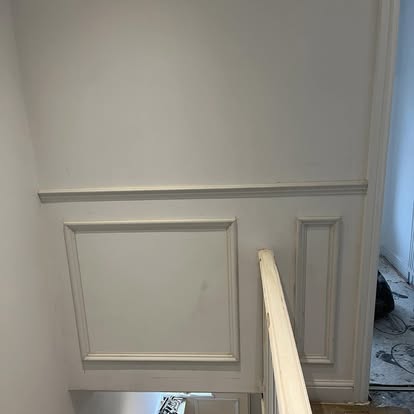 Staircase wall panelling with MDF panel frames