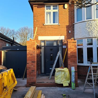 Completed brick porch with grey composite door house 181
