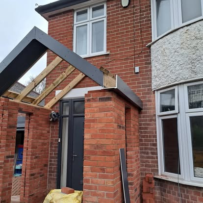 House 181 porch under construction timber rafters visible