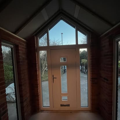 Porch interior with gabled glazed composite door looking out