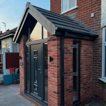Completed house 181 porch with dark grey canopy and door