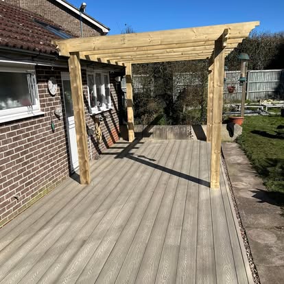 Grey composite decking and timber pergola fully completed
