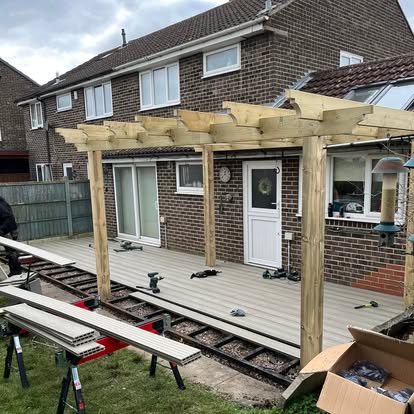 Composite decking and timber pergola under construction