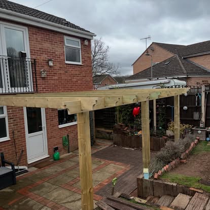 Timber pergola frame before polycarbonate roof fitted