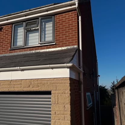 Semi-detached house fascia and soffit near garage