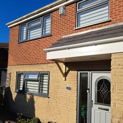 House 6 completed white UPVC soffit and canopy front view