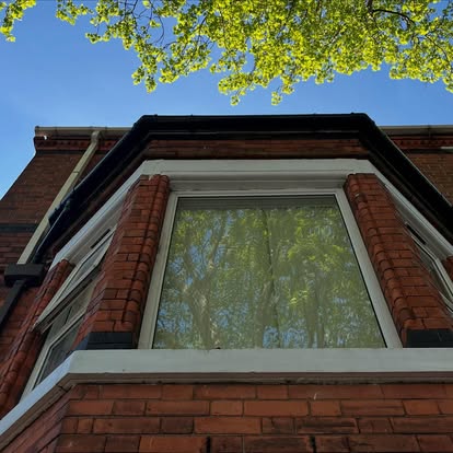 Victorian bay window completed white UPVC soffit and guttering