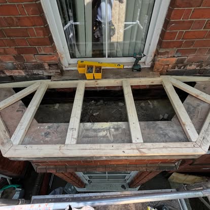 New timber frame and joists built for bay window roof