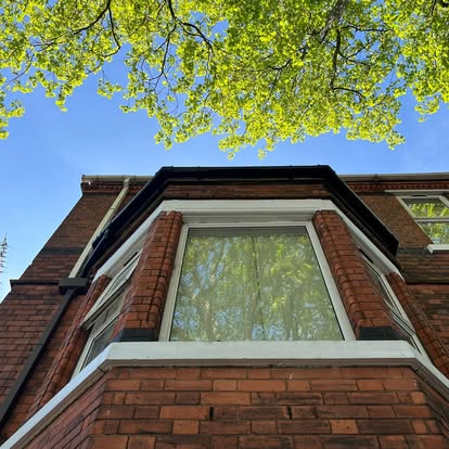 Victorian terrace bay window completed with new white UPVC fascia
