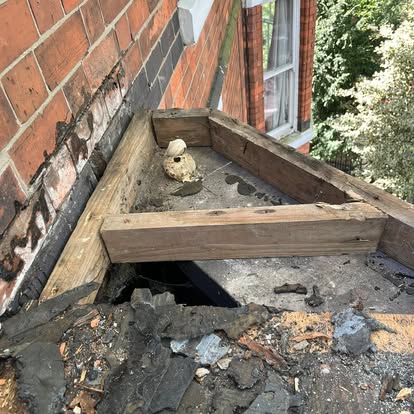New timber joists being constructed for bay window roof