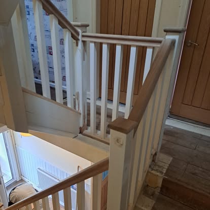 New oak newel and white spindles period house from landing