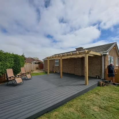 Completed grey composite deck with timber pergola