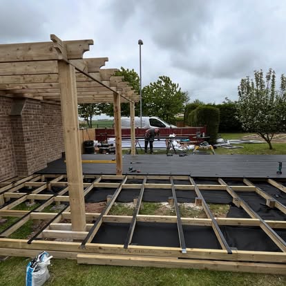 Composite deck and pergola frame under construction