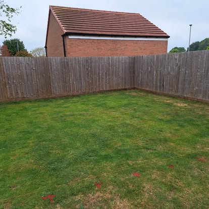 Empty new build garden marked out with string lines