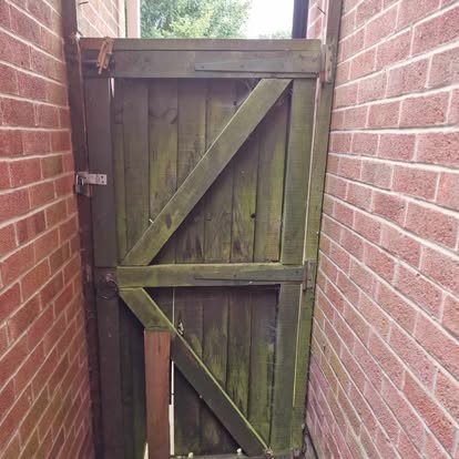 Old weathered timber side gate from reverse side