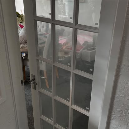 White 15-light glazed internal door installed