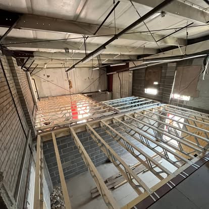 Commercial space elevated timber floor frame
