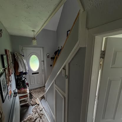 Old staircase spindles being stripped with debris