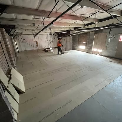 Commercial space with elevated timber floor framework