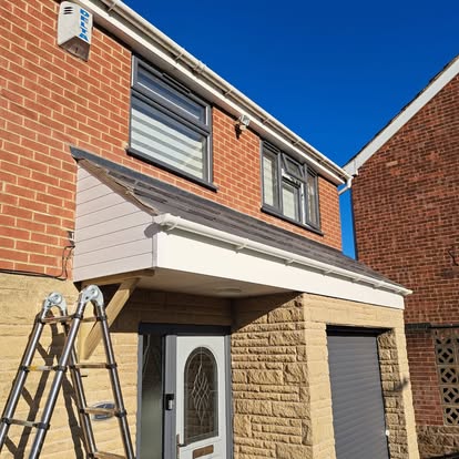 House canopy porch over front door with cladding