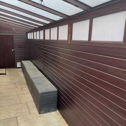 Interior of covered lean-to with composite cladding