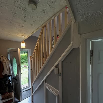 Staircase balustrade renovation with pine spindles