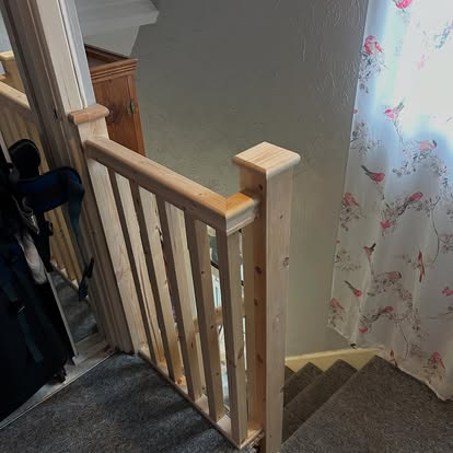 New pine stair spindles at top of landing