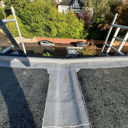 Flat roof viewed from scaffolding looking down