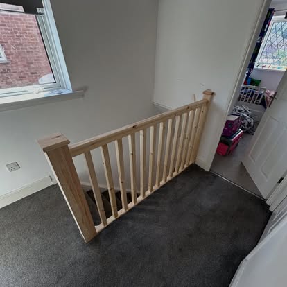 New pine staircase balustrade at landing top